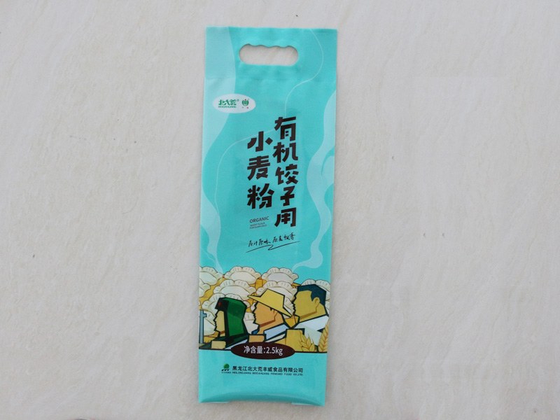 四边封带手提孔袋
